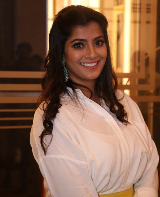 Varalaxmi Sarathkumar In White Top At Tamil Movie Celebrity Show 104